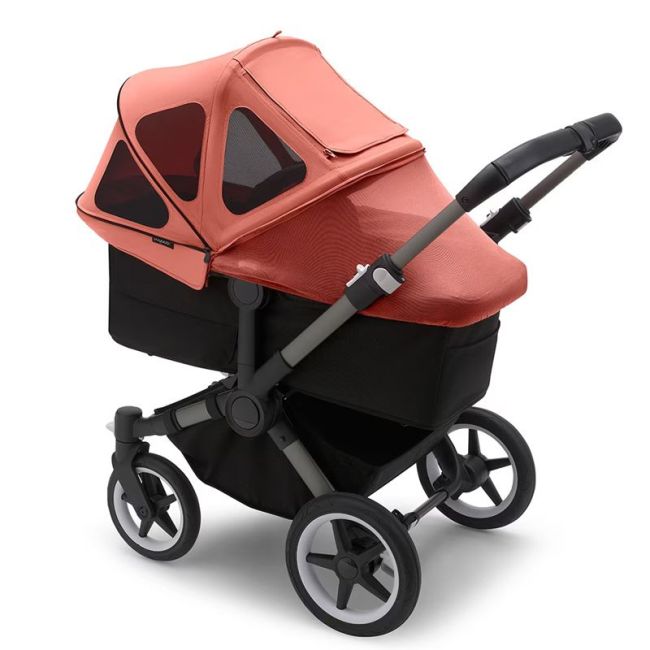 Belüftetes Verdeck für Bugaboo Donkey in Rot mit Sonnenaufgangsfarben.
